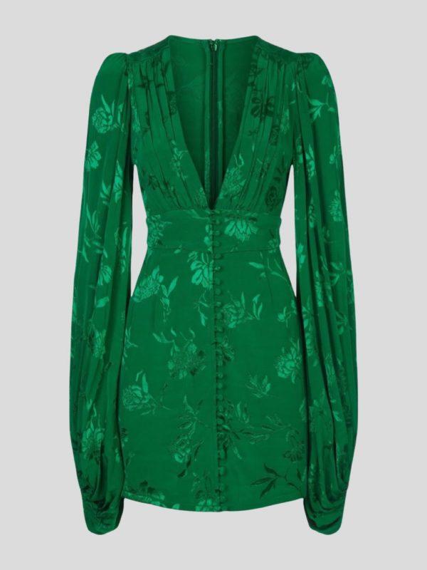 Front of green mini jacquard dress with balloon sleeves and deep v neck.
